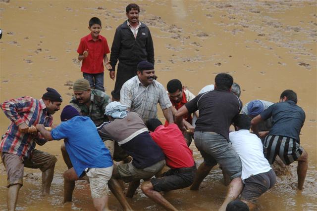 Gilmpses of tug of war at the rain festival (Small) Rain festival showcases glimpses of Kodava culture and tradition