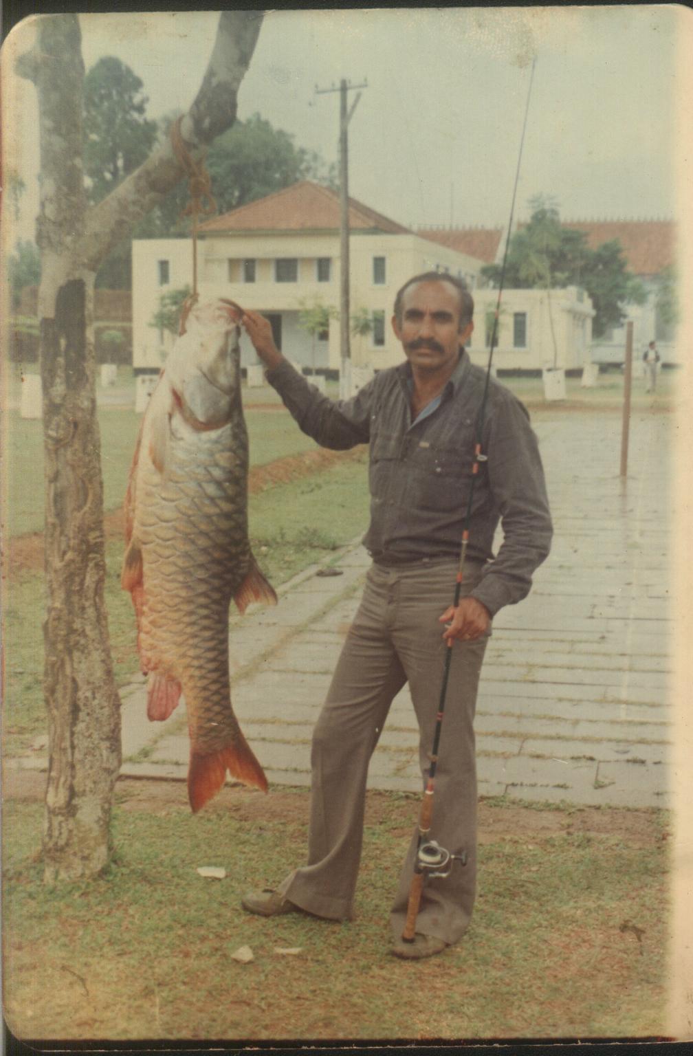 C S Ponnappa with a mahseer that he caught in 1968