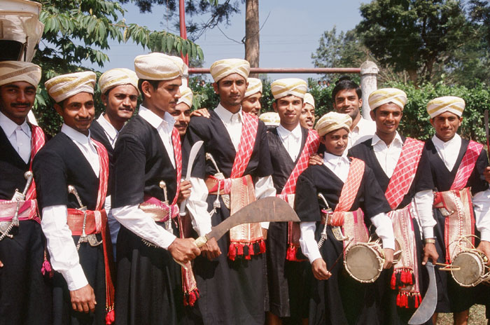 Kodava youth with traditional weapons