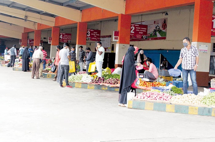 People at Coorg buy vegetables at Madikeri Bus Stand Shops Open Only On Monday And Friday